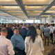 The biggest crowd at the 2022 North American International Auto Show — waiting to get through Secret Service security on Wednesday to enter the convention center while President Biden was in the building.